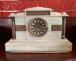 Antique onyx Ansonia mantle clock, last quarter of 19th century. Probably weighs 30 pounds. Note bronze frieze and columns. A spectacular piece!