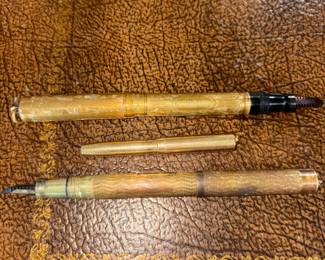 Antique gold filled fountain, pens, and a pencil