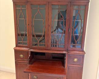 Antique breakfront with central secretary drawer