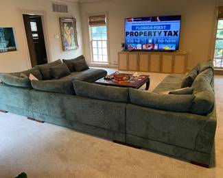 large couch - $500, cabinets below the TV are $80 each (not available for pre sale)