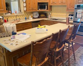 solid wood swivel bar stools - $200 for all 3