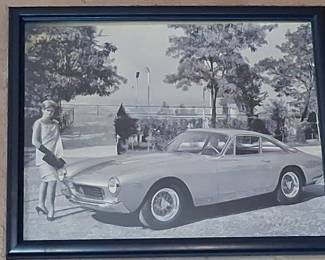 Vintage Black and White Photograph of a Woman with a Ferrari 250 GT Berlinetta