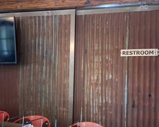 Corrugated Metal Sliding Barn Door with Restroom Sign