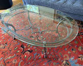 Hollywood Regency style glass top scrolled wrought iron base coffee table
