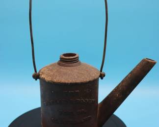 antique oil can