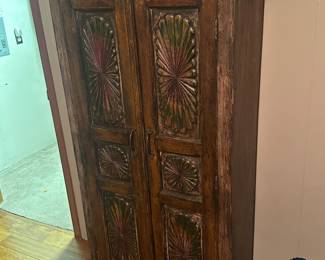 Very nice tall cabinet. Purchased at Paul Michael.