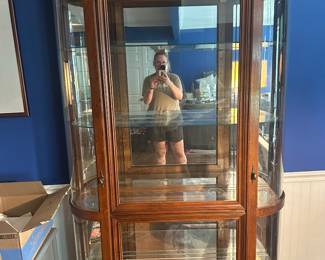 Gorgeous, curved glass, curio cabinet.  7 feet tall.