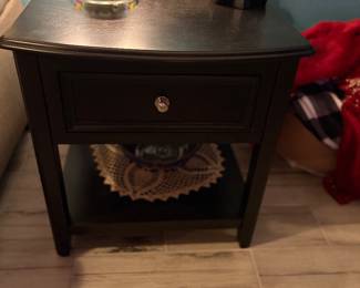 Solid wood end table.