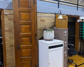 Very old gorgeous & tall cabinet with shelves- also a recycle bin and fake plant