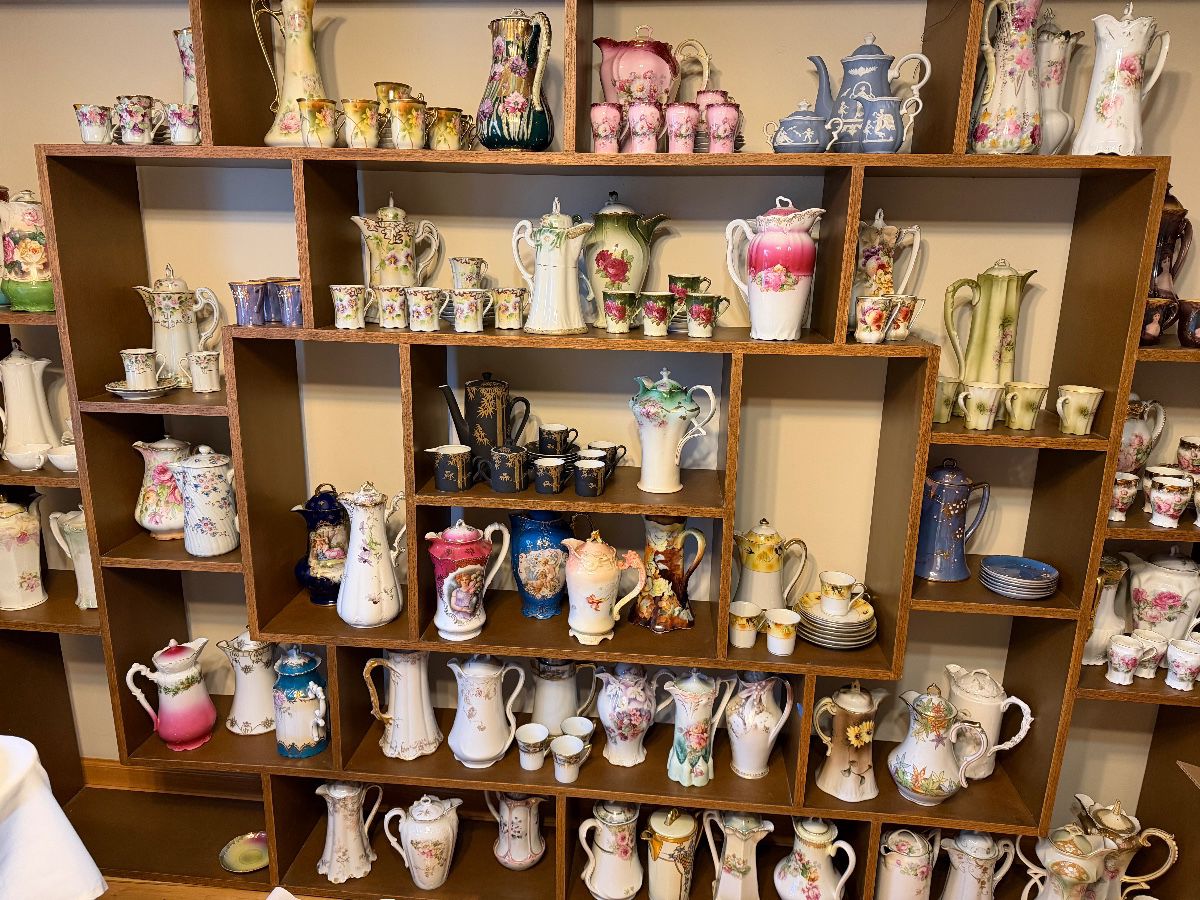 wall of porcelain hot cocoa pots