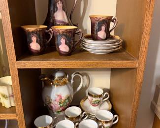 porcelain hot cocoa pot with cups and saucers