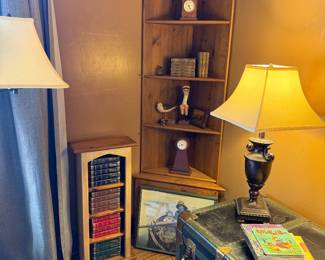 old trunk, lamps, books, display
