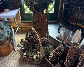 Vintage decorated sleds and huge pine cones