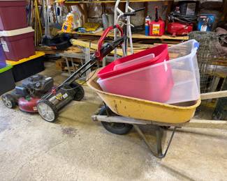 mower and wheelbarrow