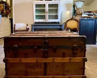 ANTIQUE ROLLING TRUNK
