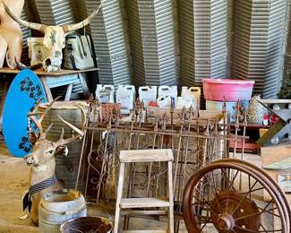 WROUGHT IRON FENCING, ANTIQUE METAL WHEEL, BUCKETS, COW SKULL
