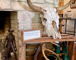 COW SKULL, JUSTIN WOMENS BOOTS, COWBOY STATUE, ANTERS