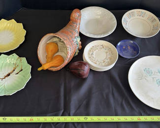 Lot 100: Assorted Decorative Ceramic Plates, Bowls, and Cornucopia Decor