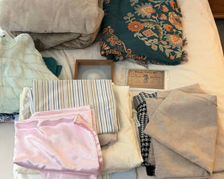 Lot 43: Assorted Bedding, Curtains, and Clothing Items