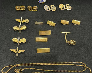 Lot 609: Collection of Military Pins, Insignia, Tie Tack, and Chain Necklace