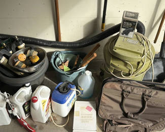 Lot 203: Scotts lawn care products, garden watering accessories, and assorted yard tools
