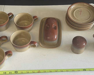 Lot 121: Stoneware Dinnerware Set with Cups, Plates, Bowls, Pitcher, Butter Dish, and Covered Container