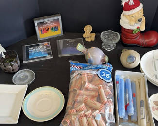Lot 107: Assorted Household Decor, Plates, Candles, and Music CDs