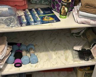Lot 15: Towels, Exercise Weights, Oral-B Brush Heads, and Household Items