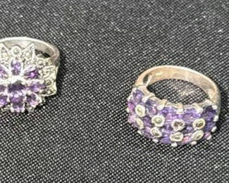 Lot 168: Two Sterling Silver Purple Stone Rings