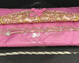 Lot 610: Pink Hanging Jewelry Organizer and Silver-Tone Leaf Necklace