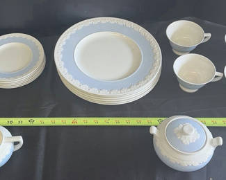 Lot 117: Blue and White Dinnerware Set with Plates, Cups, Teapot, and Creamer