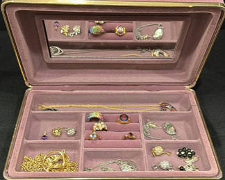 Lot 604: Pink Jewelry Box with Assorted Rings, Necklaces, Earrings, and Pendants