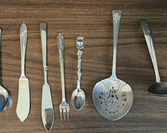 Lot 166: Assorted Silver-Tone Flatware and Serving Utensils