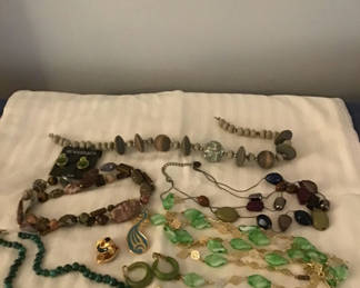 Lot 257: Assorted jewelry: necklaces, bracelets, earrings, and rings