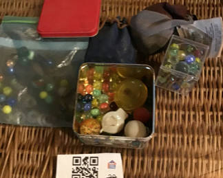 Lot 235: Marbles and marble-game accessories in tins and bags