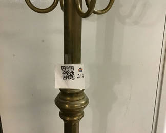 Lot 219: Brass freestanding coat rack with multiple hooks