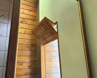 Lot 249: Rectangular wooden-framed wall mirror with carved detailing