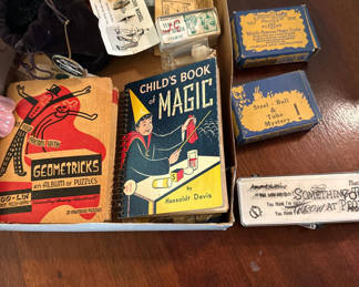 Lot 241: Vintage Magic Tricks and Puzzle Books