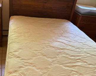 Lot 244: Carved full size wooden bed frame