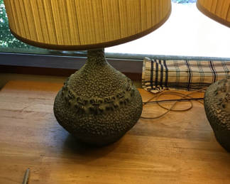 Lot 176: Pair of ceramic textured lamps with yellow shades