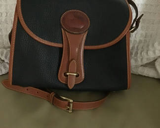 Lot 280: Navy blue Dooney and Bourke Leather Bag with Brown Trim