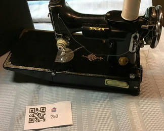 Lot 250: Vintage Singer sewing machine with case