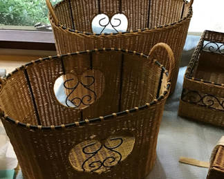 Lot 189: Wicker storage baskets with metal scroll accents