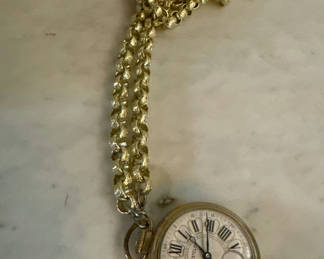 Lot 221: Westclock Gold pocket watch with chain