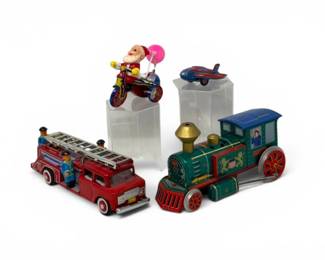 193 TinWindUpVehiclesSchyllingAirplanewSantaTricycle