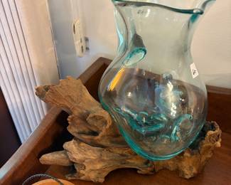 Interesting blown glass pitcher on a teak wood root