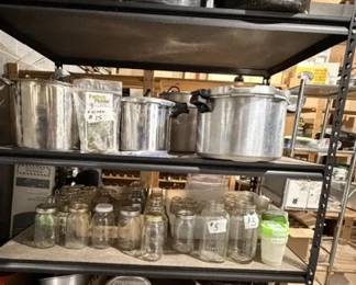 Canning equipment - new fermenting crock with stones, pressure cooks and large pots. 