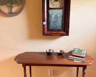 Beautiful couch table, clock, clock repair books and Thailand bowls.