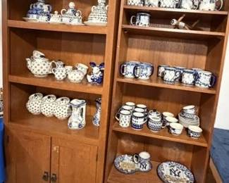 Polish pottery mugs, cheese ladies, tea sets, cannisters (wooden cabinets for sale as well) 