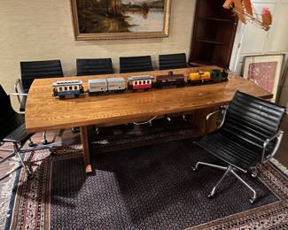 Six Herman Miller Aluminum Group Management desk chairs in black.